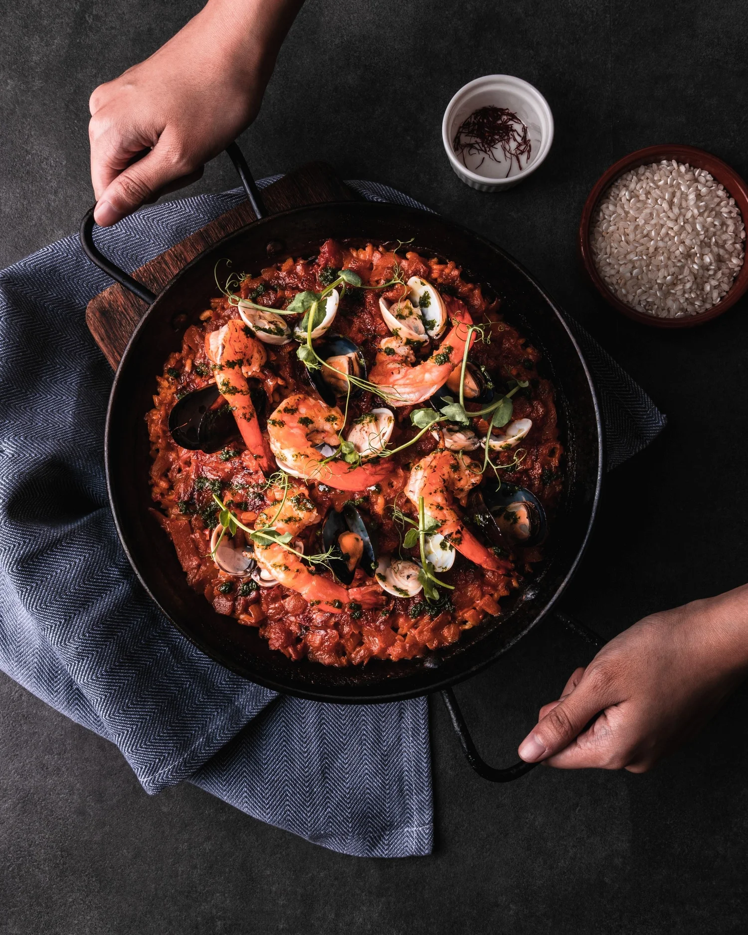 Paella de Marisco with red sea prawns, clams and mussels at UNA