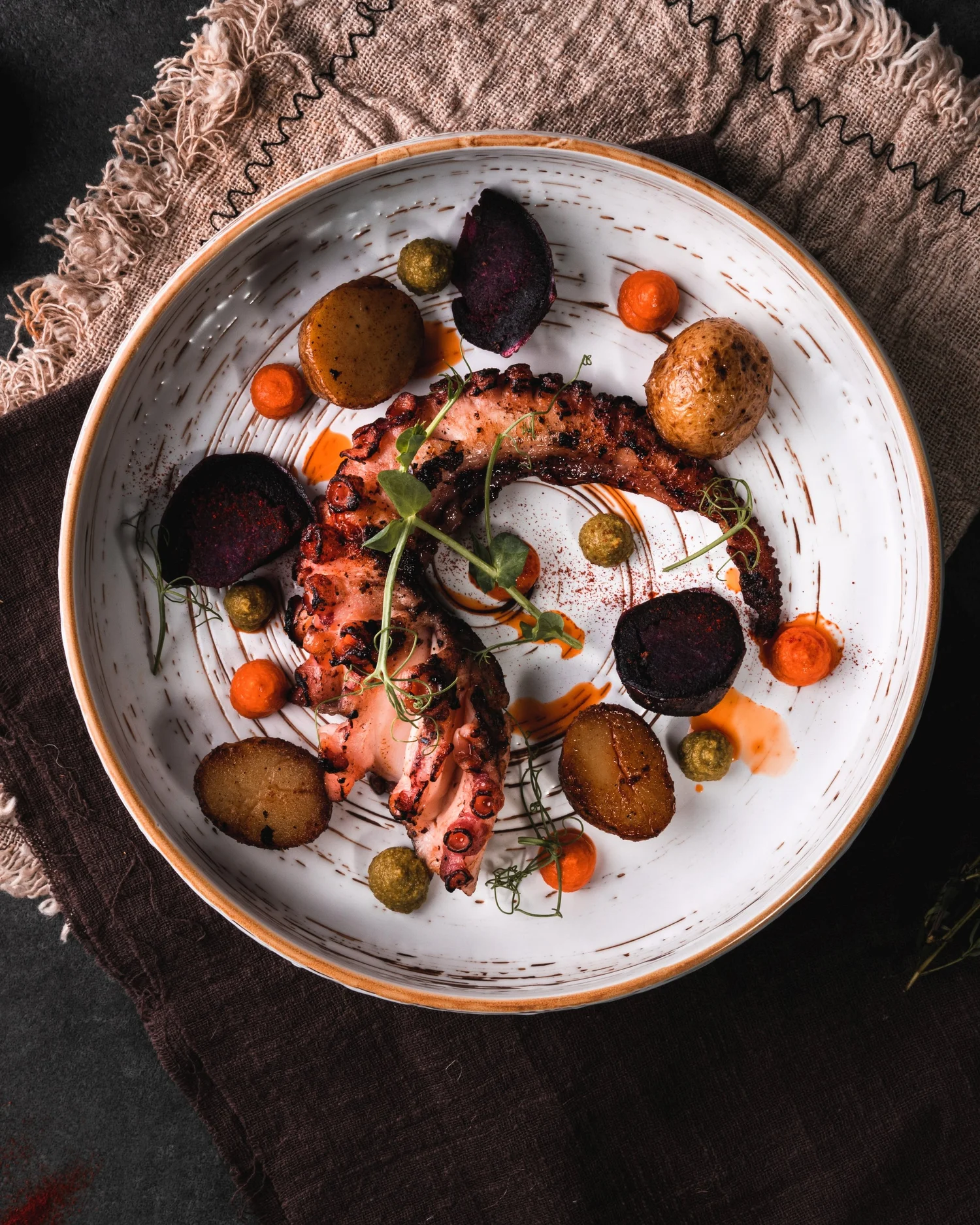 Grilled octopus dish at UNA restaurant